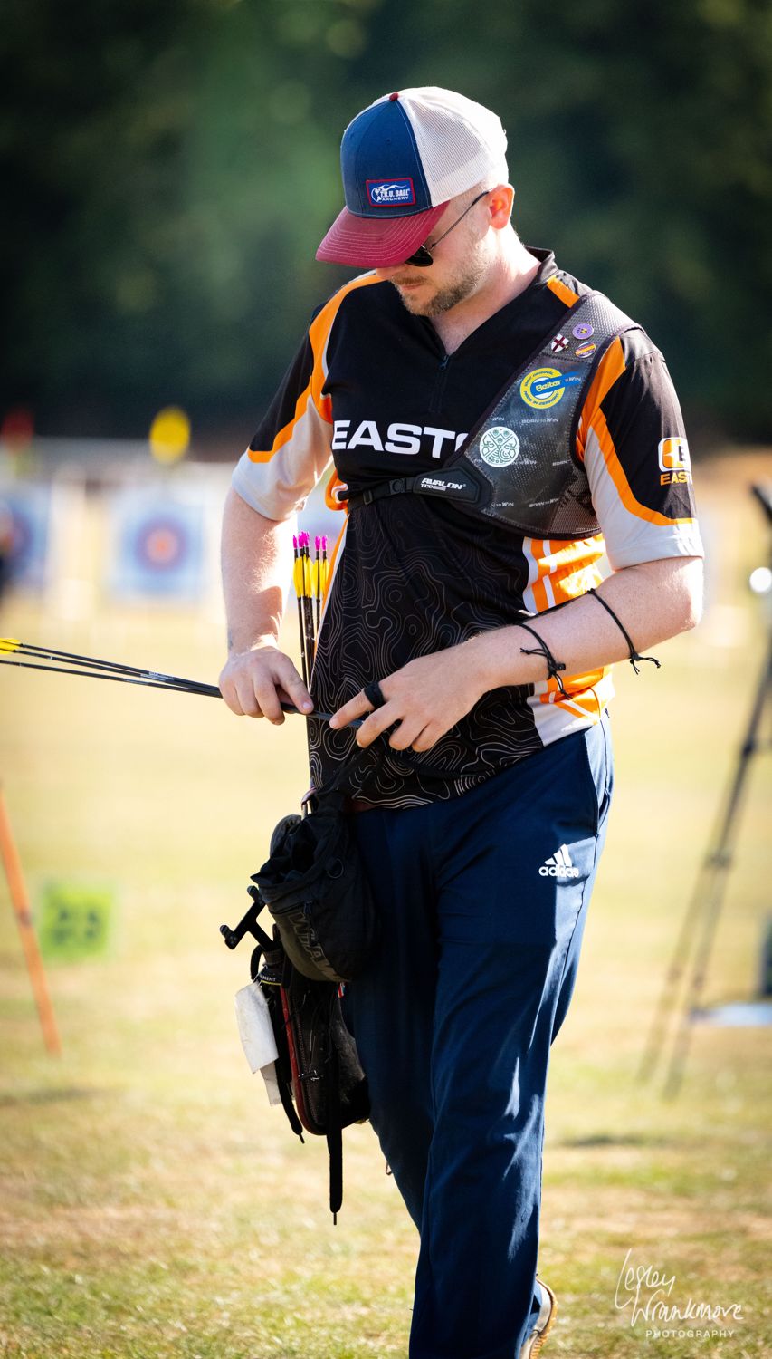 Patrick Huston walking back from the target with his arrows